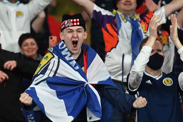 Scotland fans react after the UEFA EURO 2020 Group D football match between England and Scotland at Wembley Stadium in London on June 18, 2021. (Photo by JUSTIN TALLIS / POOL / AFP) (Photo by JUSTIN TALLIS/POOL/AFP via Getty Images)