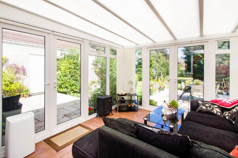 How about this for extra family space in the conservatory? There are French patio doors to the side and back, offering lots of light.
