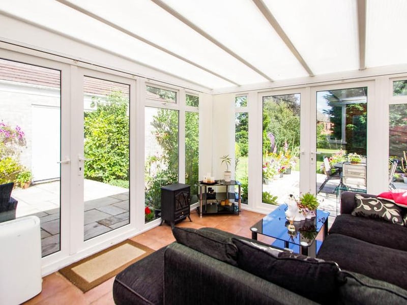 How about this for extra family space in the conservatory? There are French patio doors to the side and back, offering lots of light.
