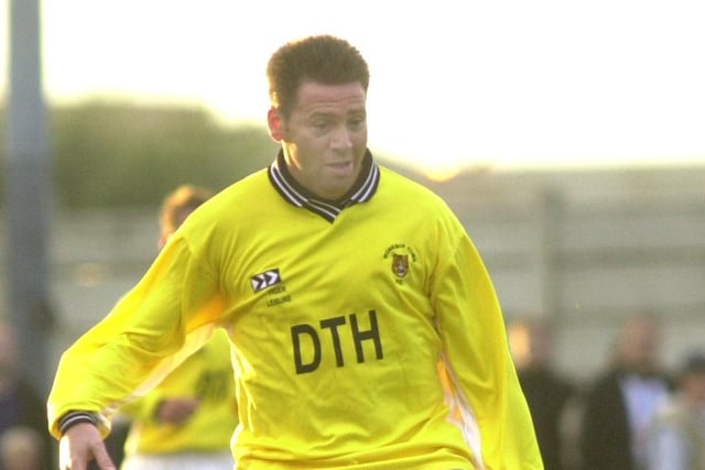 Ex Sheffield Wed star Chris Waddle is seen playing for Worksop against his old team.