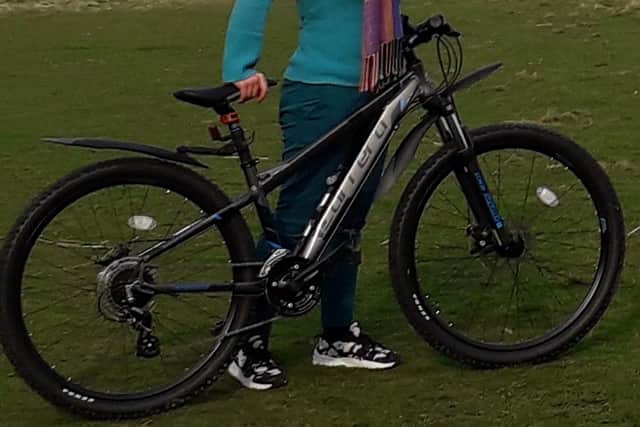 Lottie with the bike which was stolen in Links Place on Friday, May 1st.