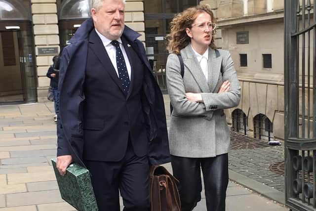 Edinburgh Central MSP Angus Robertson and his wife Jennifer arriving at Edinburgh Sheriff Court to give evidence