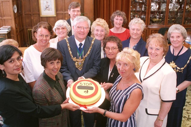The Lord Mayor Coun Frank White, centre made a presentation  to long serving lollipop ladies at Sheffield Town Hall in 1998