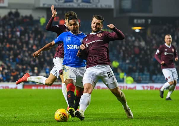 Alfredo Morelos and Craig Halkett in action the last time Hearts travelled to Ibrox in December 2019. Picture: SNS