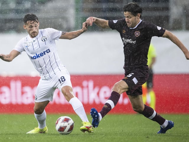 Zurich's Donis Avdijaj is put under pressure by Peter Haring
