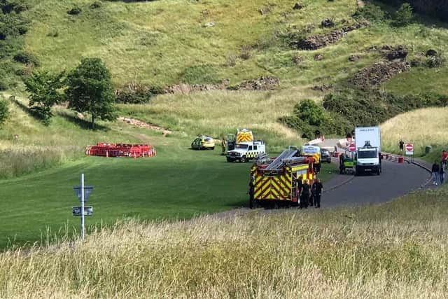 Emergency services have descended on Holyrood Park amid reports that a person has fallen from the Salisbury Crags. Picture: Layla Storstein