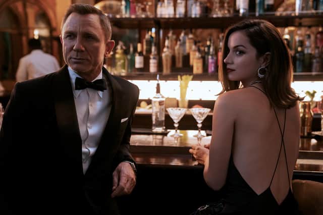 No Time To Die: Daniel Craig as James Bond and Ana de Armas as Paloma