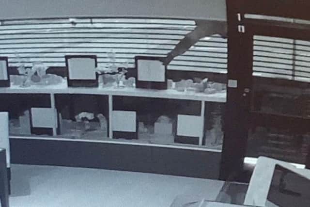 The suspect was caught on CCTV reaching into the display cabinets.