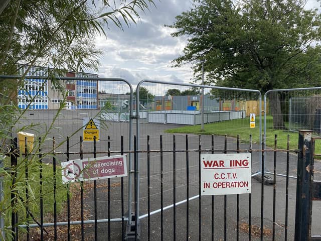 School fenced off and signs warning of 'unstable ground'