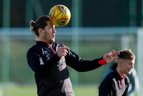 Hearts midfielder Peter Haring is stepping up his recovery.