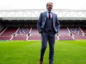 Robbie Neilson plans to look at Hearts' coaches before deciding on any changes.