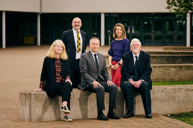Geoff Leask of YE Scotland (standing) and Sifet's Hamish Buchan (seated, far right) at Broughton High School in Edinburgh. Picture: Malcolm Cochrane Photography.