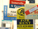 A cluster of estate agent boards and signs show the hot demand for property in the capital. PIC: Phil Wilkinson.