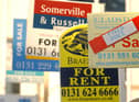 A cluster of estate agent boards and signs show the hot demand for property in the capital. PIC: Phil Wilkinson.