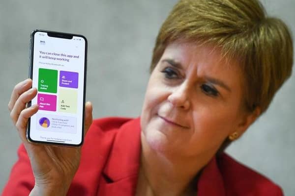 The Protect Scotland app will alert people when they have been in close contact with someone who later tests positive. (Photo by Jeff J Mitchell/Getty Images)