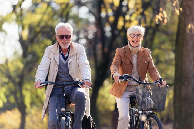 The latest hearing aid tech gives people their hobbies back such as cycling and swimming