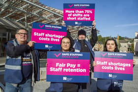 Members of the Royal College of Nursing demonstrate outside the Scottish Parliament.  Picture: Lisa Ferguson.