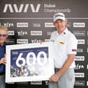 Stephen Gallacher of Scotland receives a framed print from European Tour CEO Keith Pelley to commemorate 600 starts on the European Tour ahead of the AVIV Dubai Championship at Jumeirah Golf Estates. Picture: Oisin Keniry/Getty Images.