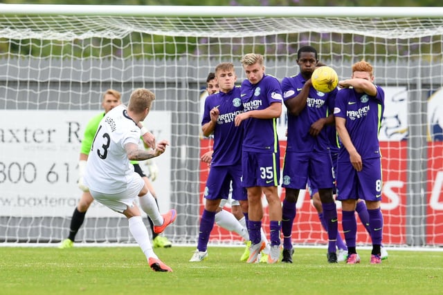 Wullie Gibson fires in a free-kick as Hibs suffer opening day embarassment at the hands of their part-time hosts. Dominique Malonga had equalised for Alan Stubbs' men after Gregor Buchanan opened the scoring. The uncertainty of Scott Allan's future, with Rangers interested in the playmaker, had a cloud hanging over the visitors.