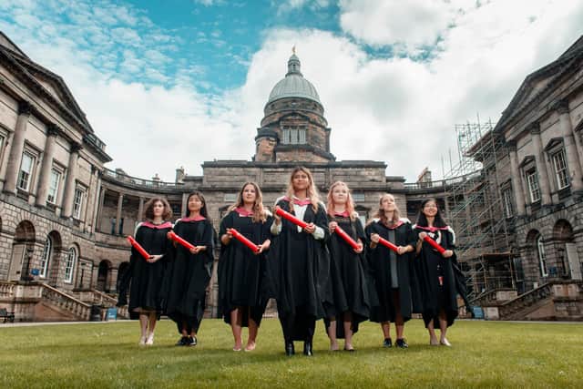 EDINBURGH, UK - July 2018:  Seven students who blazed a trail for women’s access to higher education are to be awarded posthumous honorary degrees on Saturday 6th July, 150 years after beginning their studies.  The group – known as the Edinburgh Seven – were among the first women admitted to a UK university when they enrolled to study medicine at the University of Edinburgh in 1869. The women faced substantial resistance from their male peers and were ultimately prevented from graduating and qualifying as doctors.  Pictured at Old College, seven current students at Edinburgh Medical School will collect the degrees on behalf of the women.  

The modern-day students who collected the honorary degrees on behalf of the Edinburgh Seven last year - Violet Borkowska, Hikari Sakurai, Megan Cameron, Simran Piya, Caitlin Taylor, Izzie Dighero and Mei Yen Liew - were reunited for the new work of art. Picture: Calum Bennetts