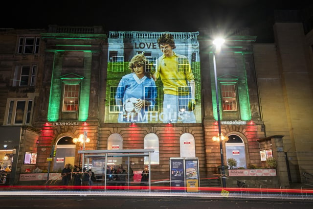 An image from the Scottish coming-of-age romantic comedy film Gregory’s Girl projected onto the Filmhouse in Edinburgh, is one of several classic movie images projected onto landmarks and public buildings in the city as part of the campaign to save the Edinburgh International Film Festival and the Filmhouse.