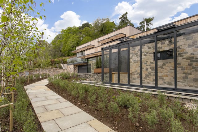 The house is enveloped by generous garden grounds and backs onto secluded woodland, ensuring you will always have complete privacy with no direct neighbours behind you, as well as an elevated position with far-reaching views.