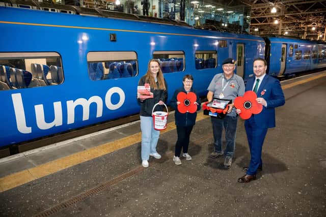 Denis and his wife Barbara with the Poppy Scotland team at Edinburgh Waverley