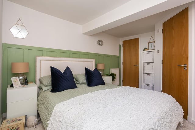 The master bedroom is tastefully presented, boasting integrated wardrobes and a modern en-suite shower room, adding a touch of luxury to your daily routine.
