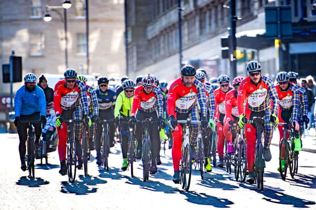 The wounded lion Charity Cycle arrives at Sheraton Festival Square.