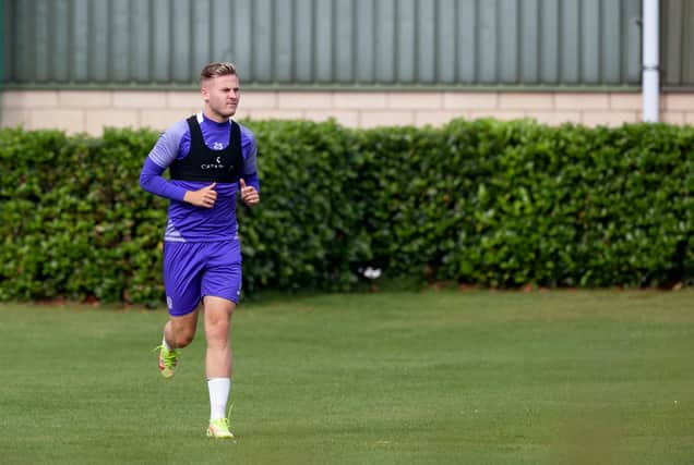 James Scott needs to get fitter to force his way back into the Hibs first-team squad, according to Jack Ross
