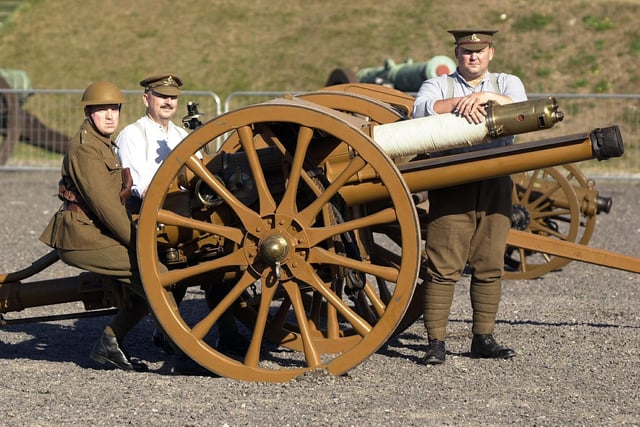 2003. Brockhurst Artillery re-enactors (l-r) Paul Jackson, Tony McNamara, and Graham Chadwick descended upon the Royal Armouries at Fort Nelson to man an 18lb. quick fire artillery piece amongst other activities open to the public demonstrating what life was like for soldiers in the Great War. Picture: Jonathan Brady 035103-39