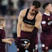 Lawrence Shankland hands his top to a young fan at full time. Picture: Mark Scates / SNS