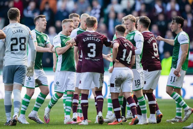 A heated exchange during the Edinburgh derby between Hibs and Hearts.