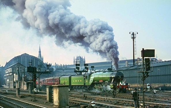 Flying Scotsman departs Kings Cross on her special on 30/4/67. Note the railwayman taking what looks like a box brownie type photograph! 4472 ran with two tenders from Oct 66.
