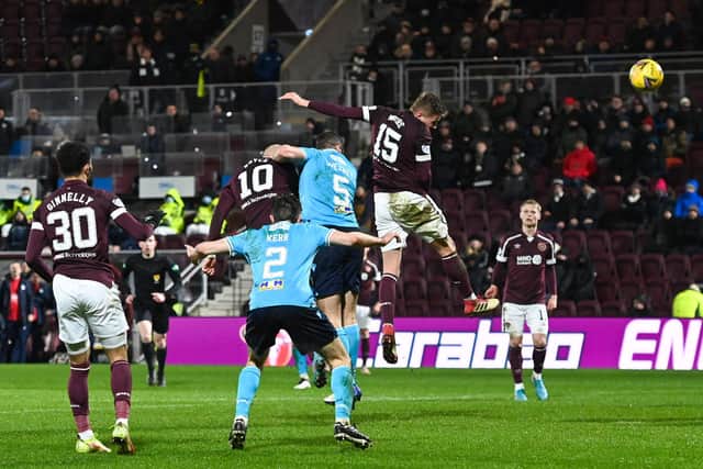 Taylor Moore fails to score with a late header as Hearts lose to Dundee at Tynecastle. Picture: SNS