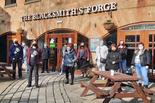 Regulars and staff at the Blacksmith's Forge pub in Dalkeith.