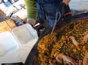 A portion of paella is served up from the Leith Walk pop-up venue. Picture: Ruairidh Mason