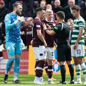 Hearts captain Lawrence Shankland is bemused after referee Nick Walsh sent Alex Cochrane off at Tynecastle.