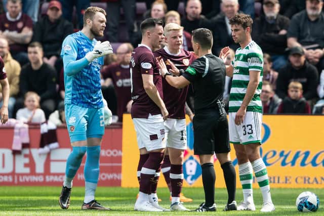 Hearts captain Lawrence Shankland is bemused after referee Nick Walsh sent Alex Cochrane off at Tynecastle.