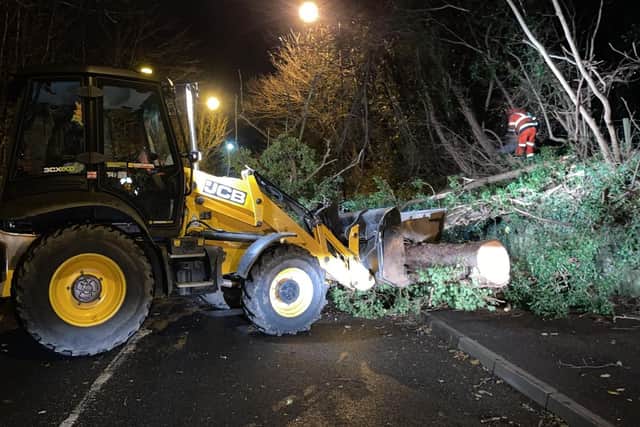 Teams clearing fallen trees on the B703, Newtongrange to Newbattle Road, in Midlothian (Photo: Midlothian Council).