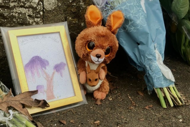 Several cuddly toys have been left among the tributes. One picture reads: “You will be missed”