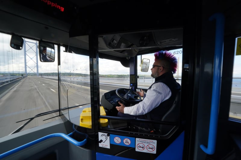 The autonomous bus drives itself across the Forth Road Bridge.  
Minister for Transport Kevin Stewart said he felt "very safe" as the bus travelled the route without anyone holding the wheel.