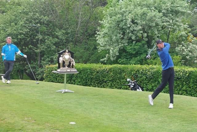 Sam Hall helped Heriot's win their third-round tie on Tuesay against a Cramond side that included Jim Keggie, who watches his younger opponent tee off at the first. Picture: National World