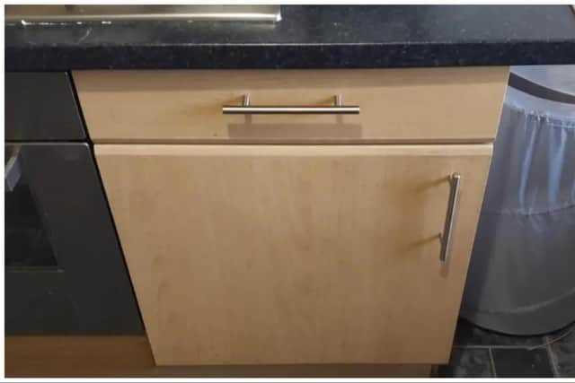 Edinburgh police said a wanted man was found within the cupboard pictured. Photo: Police Scotland
