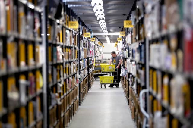 Amazon is to create more than 1,000 apprenticeships across its UK operations which include a major fulfilment centre in Dunfermline, pictured above, pre-Covid. Picture: Jane Barlow/PA