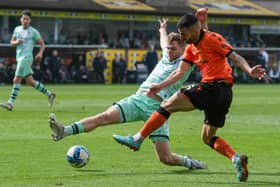 Dundee United's Azim Behich and gave Chris Cadden a torrid time at right back