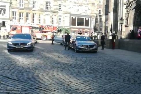 The funeral procession was guided by a piper to the Cathedral.