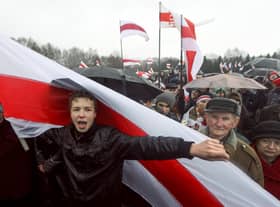 Raman Pratasevich, a prominent opponent of Belarus's authoritarian president , attends an opposition rally in Minsk in 2012 (Picture: AP)