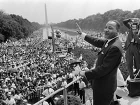 Martin Luther King waves to supporters on the Mall in Washington DC (Photo: -/AFP via Getty Images)