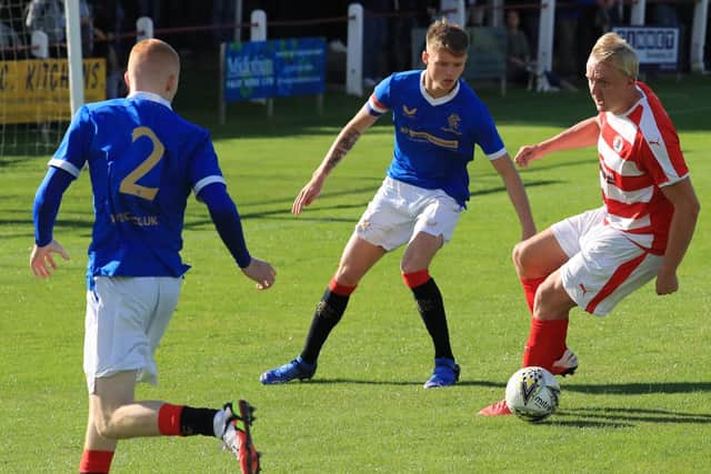 Keiran McGachie tries to find a way through during Bonnyrigg's defeat by Rangers B (pic: Joe Gilhooley)